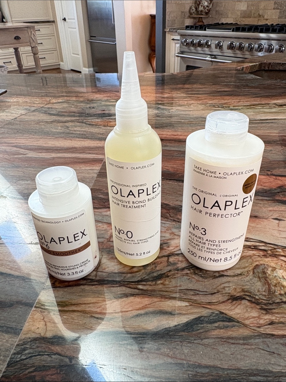OLAPLEX Treatment Trio - White and Clear Bottles